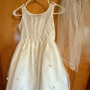 Elegant White Beaded Dress with Veil